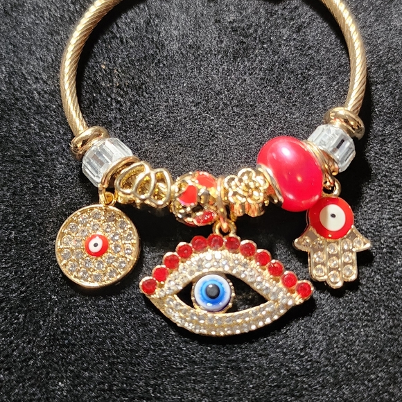 GOLD STAINLESS STEEL TWIST CHARM BRACELET - Picture 4 of 5